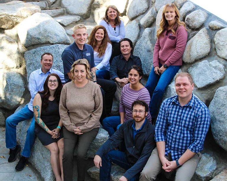 Steve's employees posing for a photo