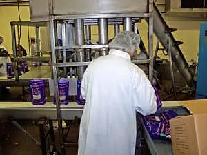 Worker in processing plant