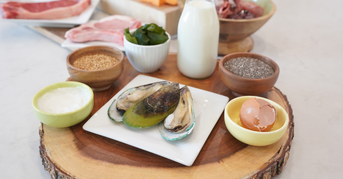 supplements on wooden board on counter